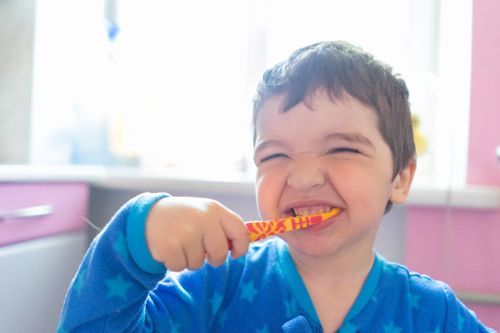 Young boy cleaning his teeth